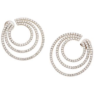 A diamond 18K white gold pair of earrings.
