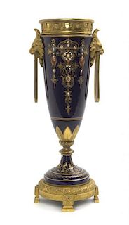 A Sevres Style Gilt Bronze Mounted Porcelain Urn, Height 11 inches.