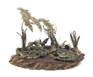 A Bronze Figural Group, Height overall 7 x width of base 10 inches.