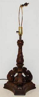 A Renaissance Revival Carved Wood Table Lamp, Height 28 inches (overall).