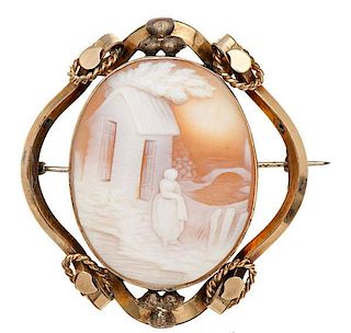 Brooch with Ornate Frame and Carved Cameo  