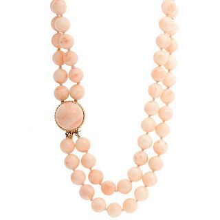 An Angel Skin Coral Necklace, A Jade Pendant, PLUS 
