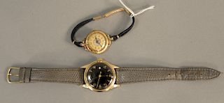Two  piece lot to include Paul Breguette date master automatic 10 karat gold filled with black face. 34mm. along with Gruen 14 karat gold ladies wrist