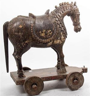 A Carved Wood Horse, Height 22 1/4 x width 22 inches.