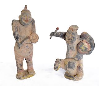 A Pair of Terra Cotta and Polychrome Drummers.