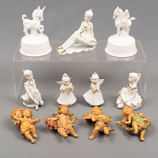 Lote mixto de 11 piezas. Siglo XX. Consta de: a) 7 figuras de pegaso, unicornio, bailarinas y ángeles. China. b) 4 amorcillos. Italia.