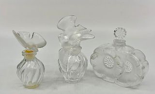 Three Lalique Crystal Perfume Bottles