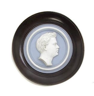 A Continental Bisque Porcelain Profile Medallion, Diameter 6 inches.