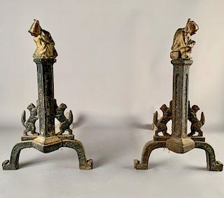 A Pair of Cast Iron Andirons Decorated with Witches