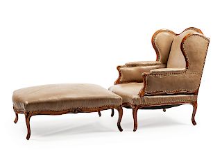 A Louis XV Leather Upholstered Carved Walnut Duchesse Brisee