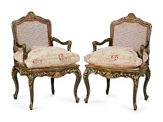 A Pair of Louis XV Style Painted and Parcel Gilt Fauteuils