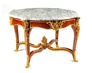 A Louis XV Style Gilt Bronze Mounted Center Table
