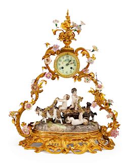 A Louis XV Style Gilt Bronze and Porcelain Figural Clock