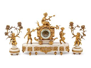 A Louis XVI Style Gilt Bronze and Marble Clock Garniture