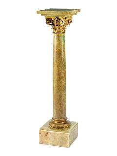 A Louis XVI Style Gilt Bronze Mounted Onyx Pedestal 