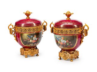 A Pair of Sevres Style Gilt Metal Mounted Porcelain Urns