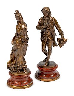 A Pair of French Patinated Bronze Figures