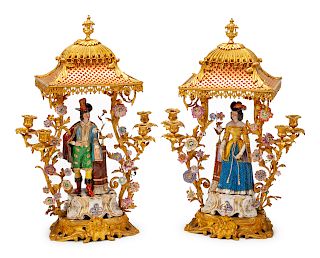 A Pair of French Gilt Bronze and Porcelain Four-Light Candelabra