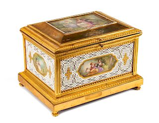A French Gilt Bronze and Reticulated Porcelain Box