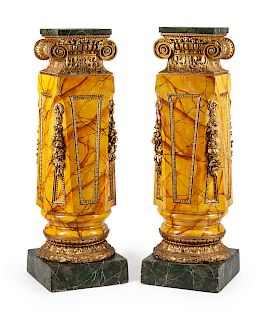A Pair of Italian Giltwood and Faux Marble Pedestals