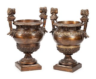 A Pair of Pompeian Style Patinated Metal Urns 