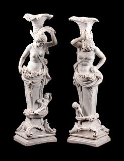 A Pair of Italian Marble Figural Torcheres