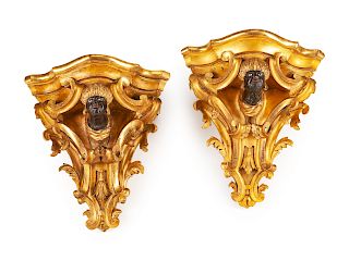 A Pair of Italian Painted and Giltwood Brackets