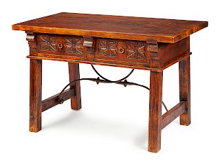 A Spanish Renaissance Revival Wrought Iron Mounted Oak Table 