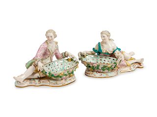 A Pair of German Porcelain Figural Sweetmeat Dishes