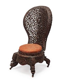 An Anglo-Indian Carved Slipper Chair 