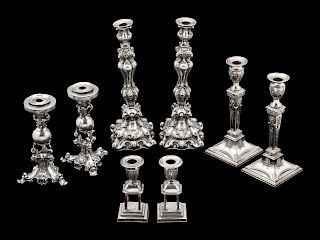 Four Pairs of Silver-Plate Candlesticks