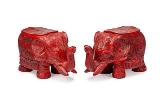 A Pair of Chinese Carved Red Lacquer Elephant Seats