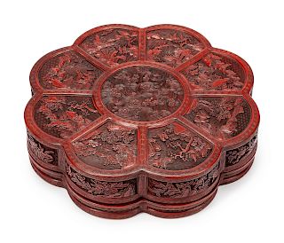 A Chinese Carved Red Lacquer Floriform Box