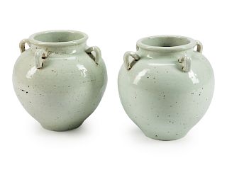 A Pair of Chinese White-Glazed Porcelain Urns
