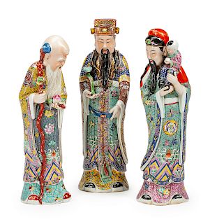 Three Chinese Porcelain Figures of Scholars