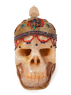 A Large Tibetan Style Silver Filigree, Lapis Lazuli, Coral and Turquoise Mounted Rock Crystal Skull