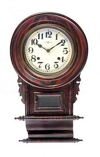 * An American Painted Faux Wood Grain Clock, Height 22 inches.