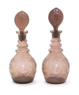 A Pair of Amethyst Glass Decanters, Height 13 1/2 inches.