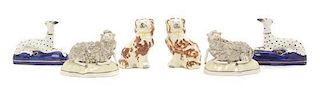 * Two Pairs of Staffordshire Pottery Dogs, Width of first pair 5 inches.