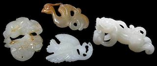 Four Carved Jade Toggles