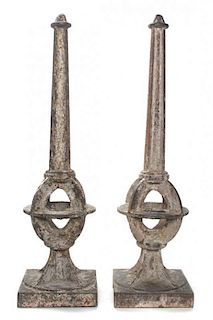 A Pair of Iron Ornaments, Height 28 inches.