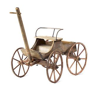 A Wooden Child's Wagon, Height 25 inches.