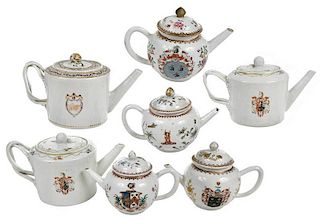 Seven Chinese Export Armorial Porcelain Teapots
