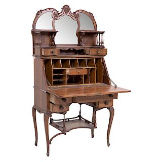 SECRETAIRE. MEXICO, BEGINNING OF THE 20TH CENTURY. French style. Carved wood secretaire. Fall-front door, drawers, compartments and mirror in the uppe