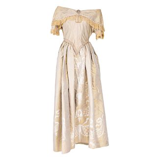 DRESS AND UMBRELLA, CIRCA 1900. Silk satin dress decorated with floral motifs and fringes. The umbrella in silk satin. 