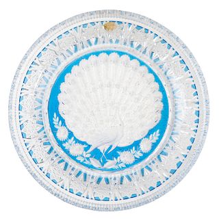 PLATO. GERMANY, XX CENTURY. In JOSEPHINE HUTTE crystal transparent and blue color. Circular design. Decorated with central peacock.