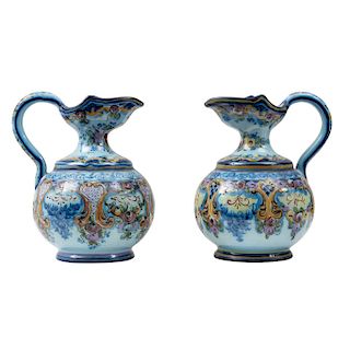 PAIR OF JUGS. PORTUGAL, XX CENTURY In majolica RB ALCOBAÇA color blue. Hand decorated with floral patterns. Pieces: 2