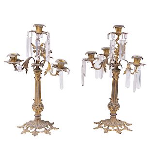 PAIR OF CANDELABROS. ITALY, PRINCIPLES OF XX CENTURY. Gold metal foundries. For 4 lights. With plant motifs. Pieces: 2