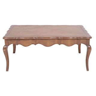 CENTER TABLE. XX CENTURY. Made of carved wood. Rectangular roof with semi-circular supports.