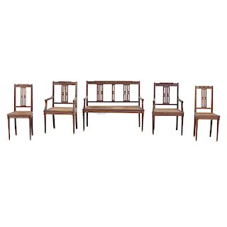 LIVING ROOM. XX CENTURY. EMPIRE STYLE. Made of carved wood and woven vine. Bench, pair of chairs and pair of armchairs. Pieces: 5